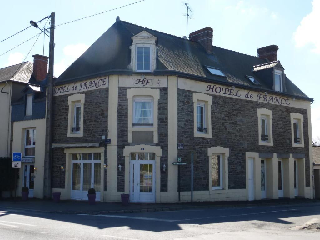 Hotel De France, a stone hotel building in Pontorson near Mont-Saint-Michel